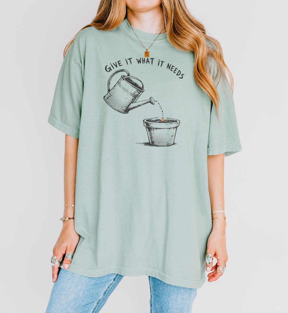 Give It What It Needs Watering Can Pouring Into Pot Tee